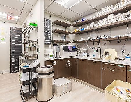 a kitchen with a lot of cabinets and a lot of appliances at pediatric dentistry Reston in Reston, VA