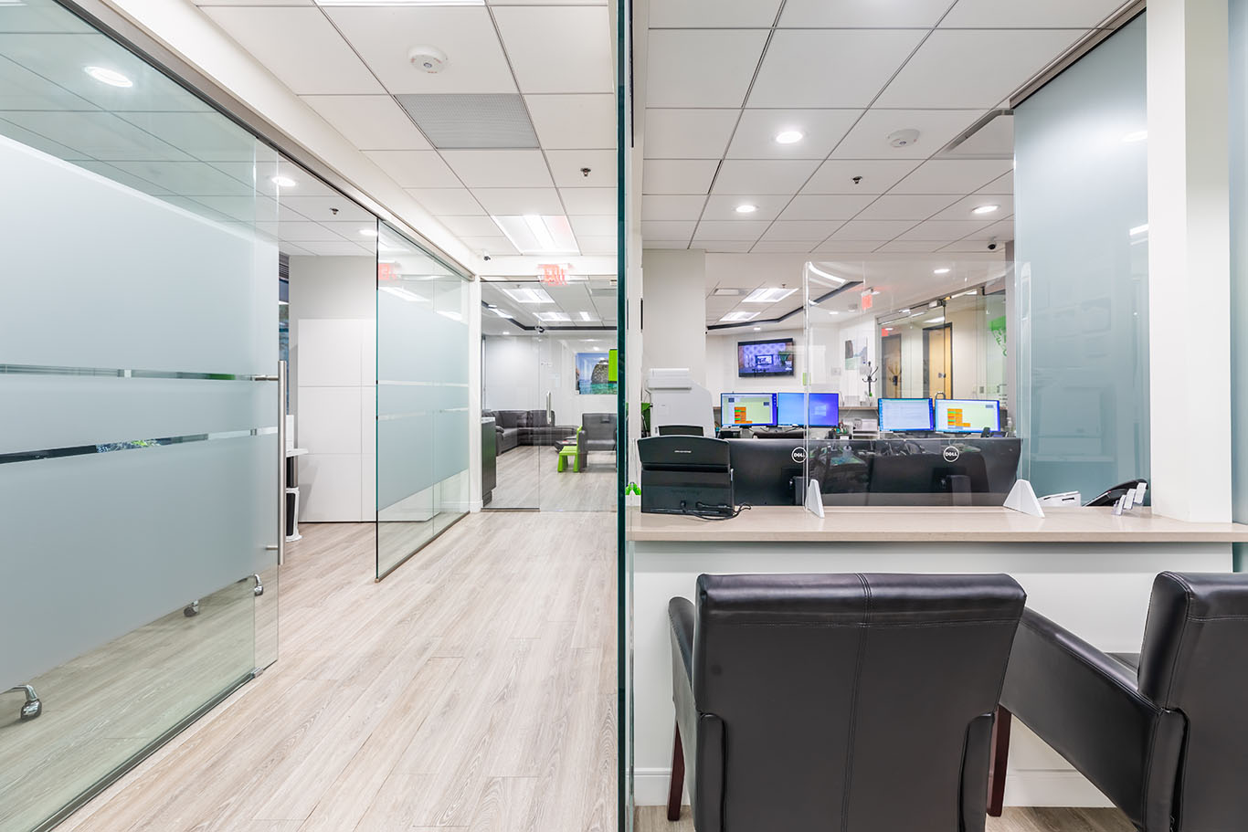 a room with a large window and a large mirror  at teeth whitening Reston in Reston, VA