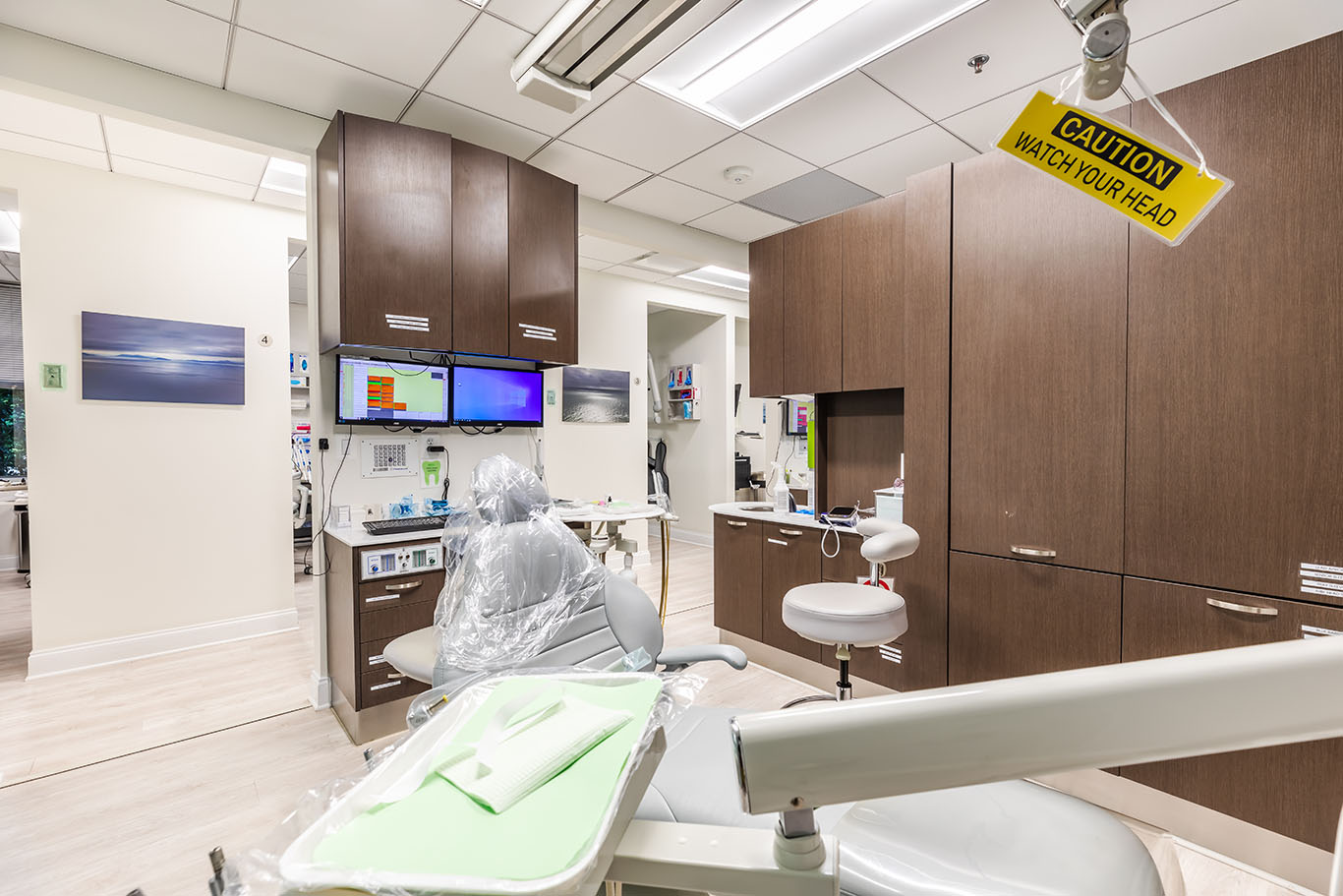 a kitchen with a sink, a refrigerator, and a microwave  at preventive dental care in Reston, VA