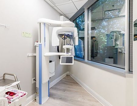 a bathroom with a mirror and a sink  at teeth whitening Reston in Reston, VA