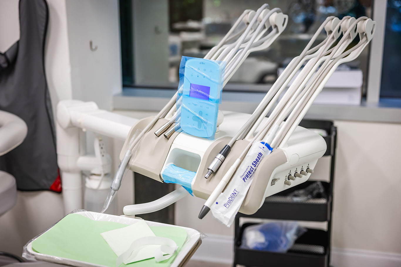 dental machine and tools on a table  at Reston Family Dental in Reston, VA