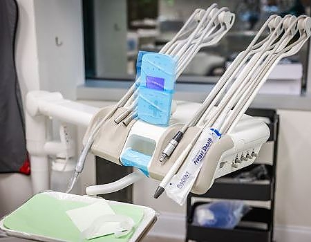 dental machine and tools on a table  at Reston Family Dental in Reston, VA