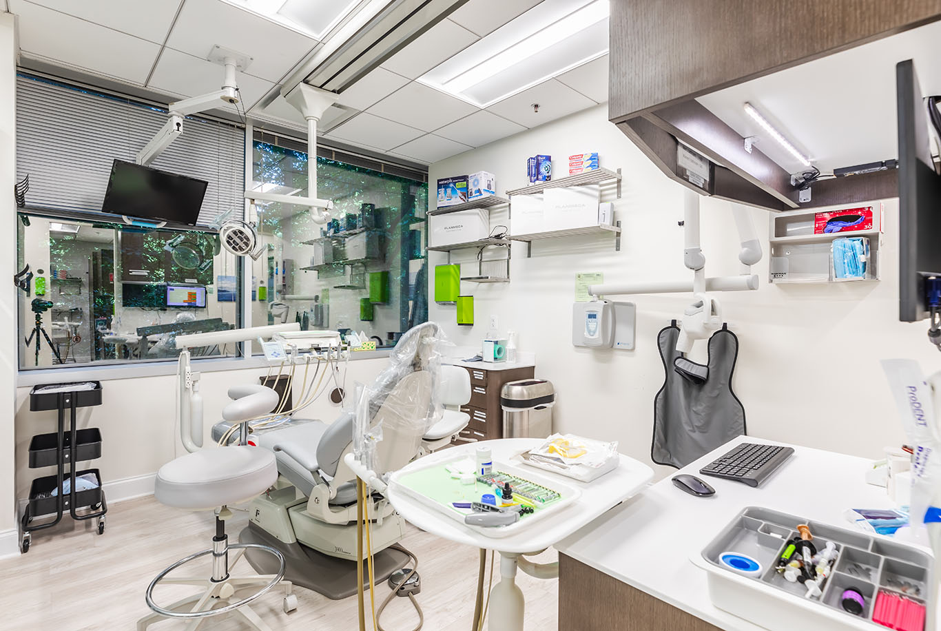 a kitchen with a sink, a toilet and a counter top  at cosmetic dentistry in Reston, VA