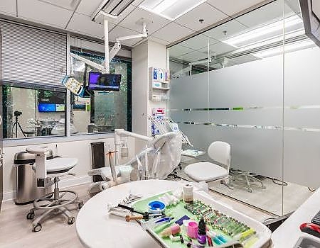 a room with a lot of clutter and a lot of chairs  at teeth whitening Reston in Reston, VA